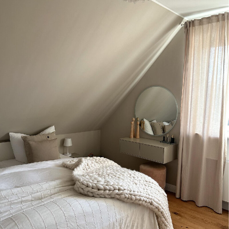 Camera da letto nei toni del beige