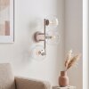Lampada da parete moderna Koyoto con 3 sfere in vetro rigato chiaro