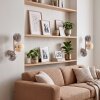 Applique da parete Gastor, set da 2 con tre sfere verticali, accanto al divano